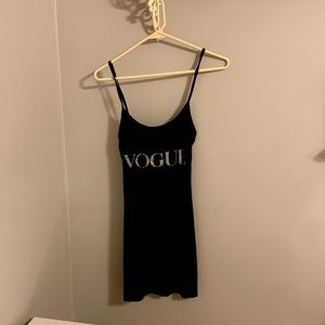 Black vogue dress. Size small but can fit medium